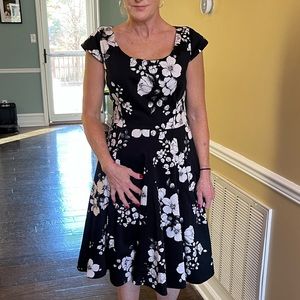 Love it and wish it still fit! WHBM red satin petticoat black/white w/pockets! M